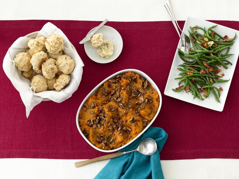 <p>If you like your sides strictly savory, this rosemary-topped version can replace the usual marshmallow-bedecked casserole.</p><p><a href="https://www.womansday.com/food-recipes/food-drinks/recipes/a12148/mashed-sweet-potatoes-rosemary-pecans-recipe-wdy1112/" rel="nofollow noopener" target="_blank" data-ylk="slk:Get the recipe for Mashed Sweet Potatoes with Rosemary Pecans.;elm:context_link;itc:0;sec:content-canvas" class="link "><em>Get the recipe for Mashed Sweet Potatoes with Rosemary Pecans.</em></a></p>