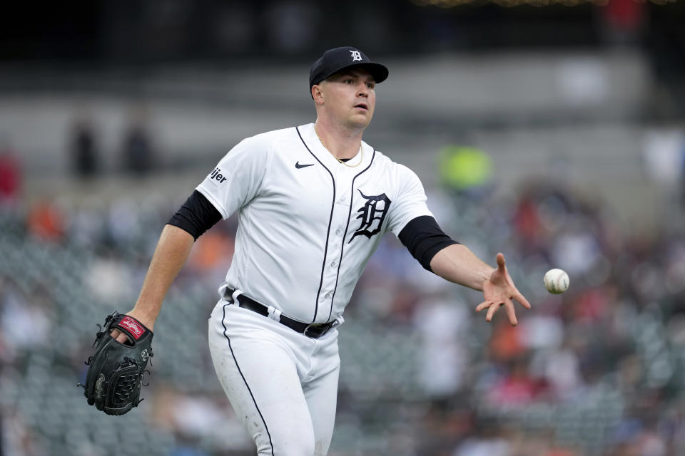 Detroit Tigers pitcher Tarik Skubal tosses the ball to first base for an out on a Chicago Cubs' Patrick Wisdom ground ball in the fourth inning of a baseball game, Wednesday, Aug. 23, 2023, in Detroit. (AP Photo/Paul Sancya)