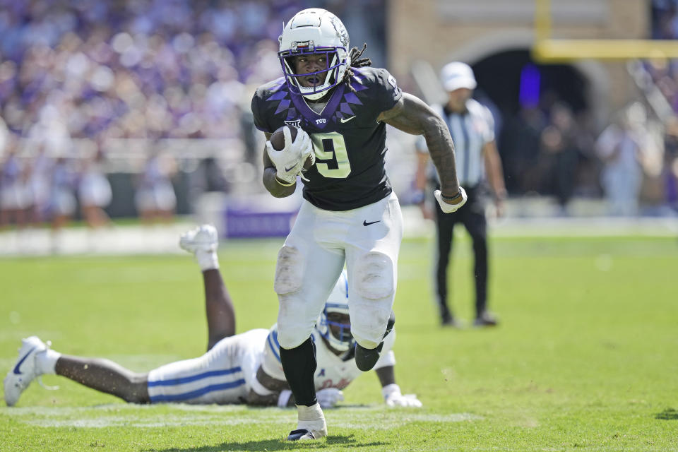 TCU running back Emani Bailey (9) breaks away on his way to score a touchdown during the second half of an NCAA college football game against SMU Saturday, Sept. 23, 2023, in Fort Worth, Texas. (AP Photo/LM Otero)