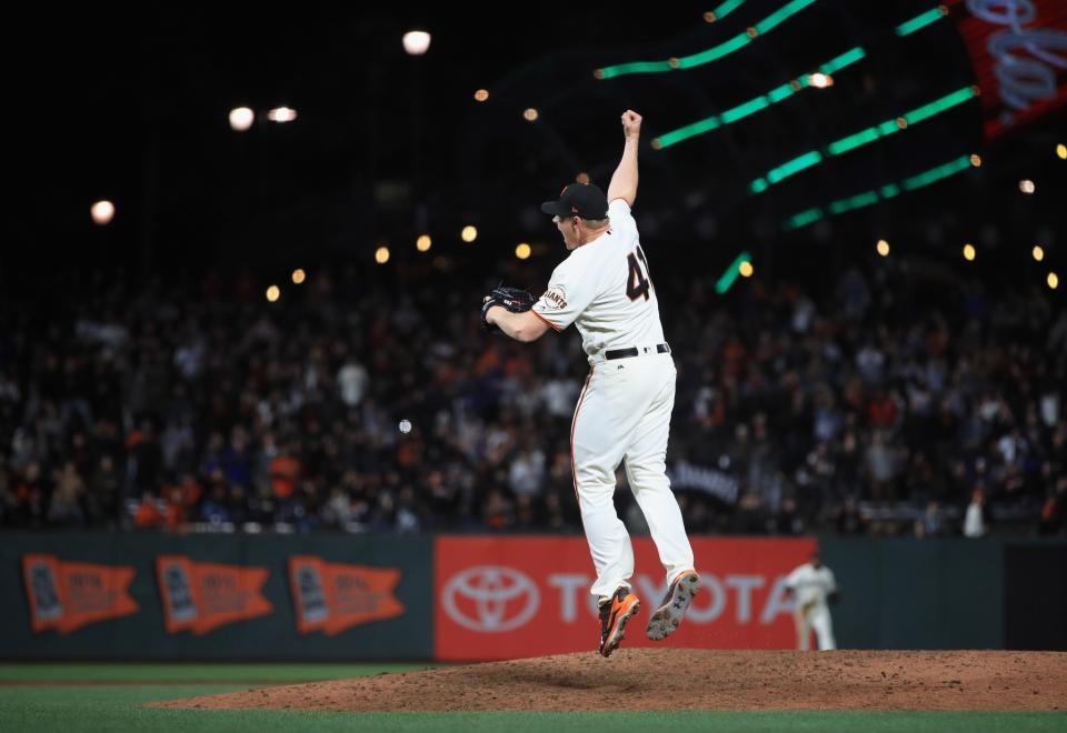 Giants closer Mark Melancon jumps for joy after the final out. (Getty Images)