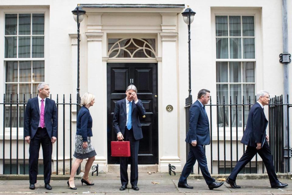 Philip Hammond leaves 11 Downing Street to give his Budget (Getty)