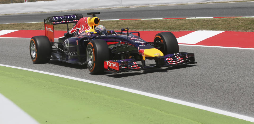 Red Bull driver Sebastian Vettel of Germany steers his car during the qualifying session ahead of the Spain Formula One Grand Prix at the Barcelona Catalunya racetrack in Montmelo, near Barcelona, Spain, Saturday, May 10, 2014. Vettel's car rolled to a halt during Friday's first practice session, and it failed him again early in the third period of qualifying.(AP Photo/Luca Bruno)