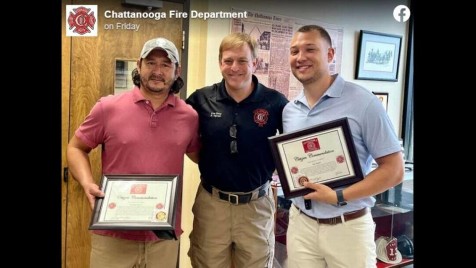 Fernando Rivera and Sam Triplett were recognized for rescuing two residents from a burning home.