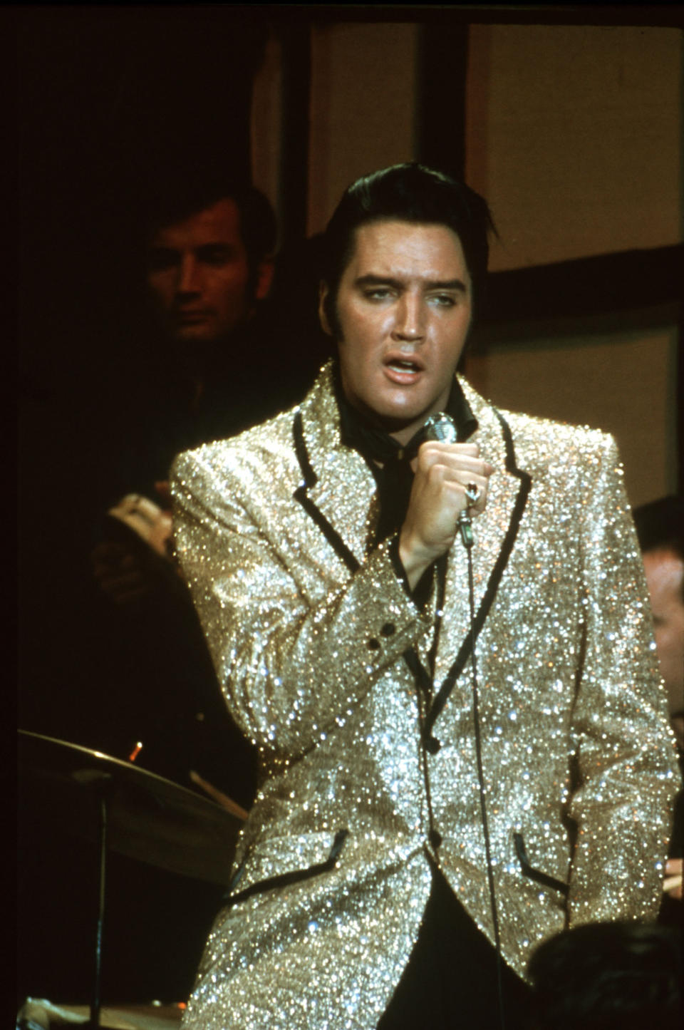 BURBANK, CA - JUNE 27: Rock and roll musician Elvis Presley performing the song "Trouble" on the Elvis comeback TV special on June 27, 1968 in Burbank, California. (Photo by Michael Ochs Archives/Getty Images)