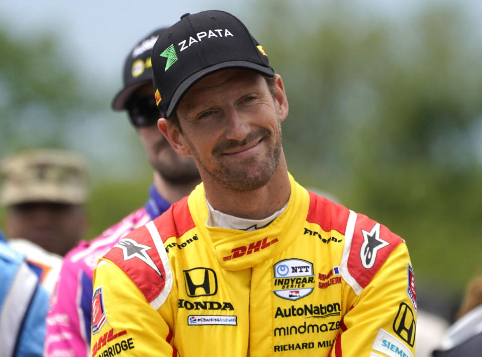 FILE - Romain Grosjean looks on before the IndyCar Detroit Grand Prix auto race on Belle Isle in Detroit, June 5, 2022. The IndyCar season begins Sunday, March 5, 2023, with the Grand Prix of St. Petersburg.(AP Photo/Paul Sancya, File)