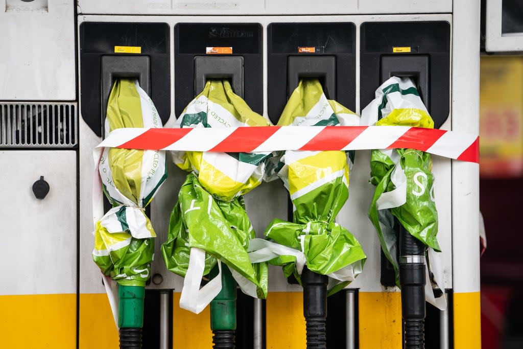 Closed off petrol pumps at a Shell petrol station in central London (Dominic Lipinski/PA) (PA Wire)