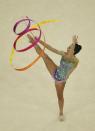 <p>Varvara Filiou (GRE) of Greece competes using the ribbon. (Reuters) </p>