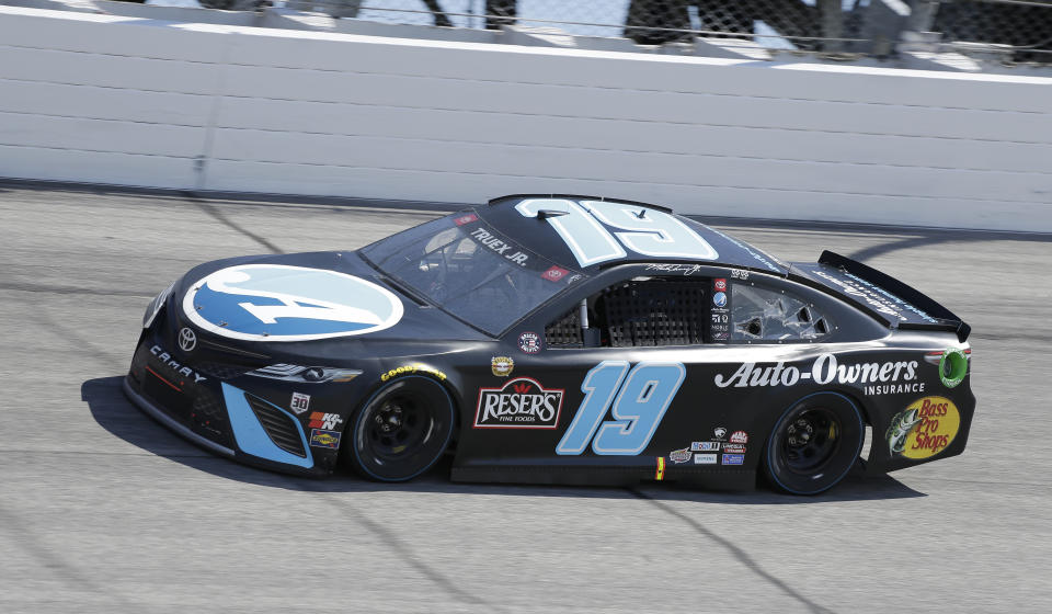 Martin Truex Jr. drives into Turn 1 during the NASCAR Cup Series auto race at Darlington Raceway, Sunday, May 9, 2021, in Darlington, S.C. (AP Photo/Terry Renna)