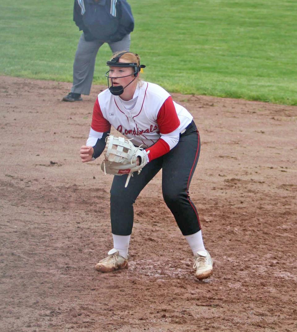 Coldwater's Mackenzie Searing locks it down at first base on Saturday. Searing pitched a gem in the first game to give the Cardinals the win