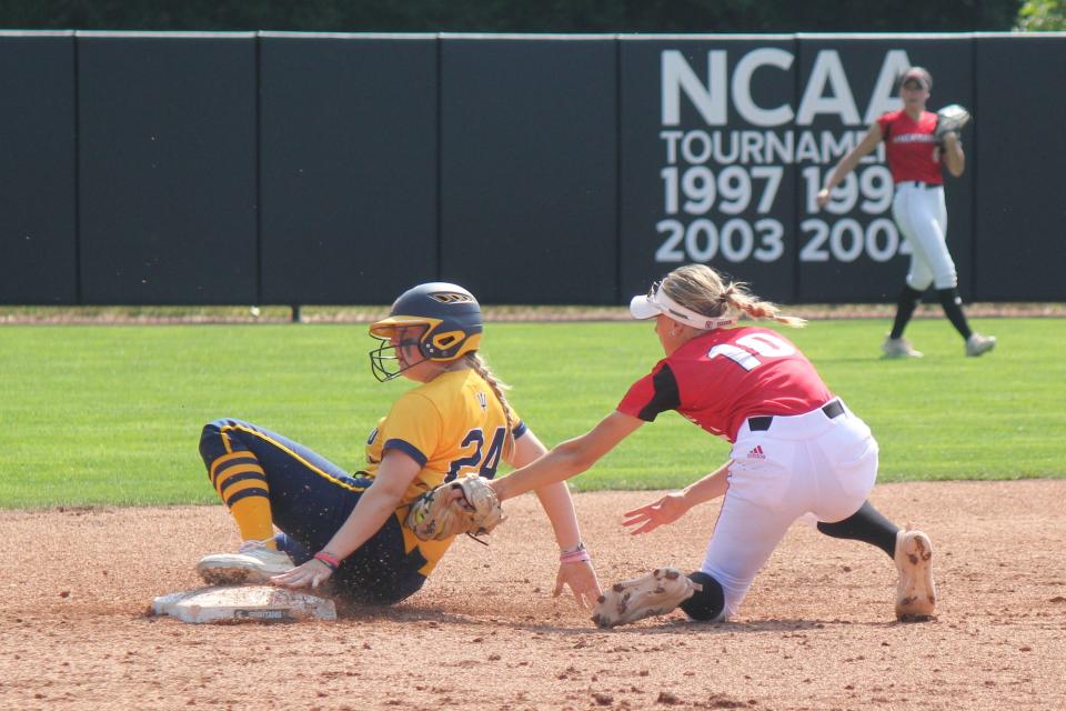 Gaylord’s Braleigh Miller slides past a late tag from Vicksburg shortstop Madison Diekman for a steal of second base during Gaylord's 8-3 win in the Division 2 state final on Saturday, June 17, 2023, in East Lansing. Miller’s four hits tied an MHSAA championship-game record.