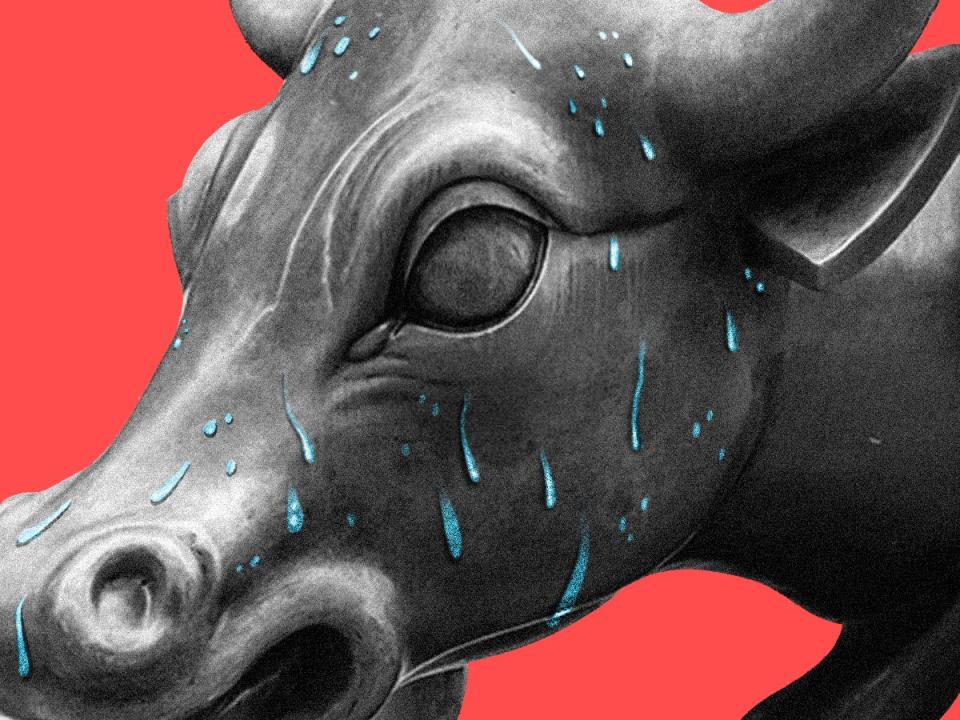 The charging bull with a worried expression and sweating with a red background