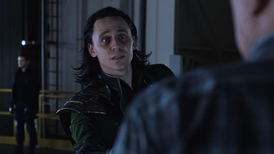 A weary Loki speaks to someone in Marvel's The Avengers