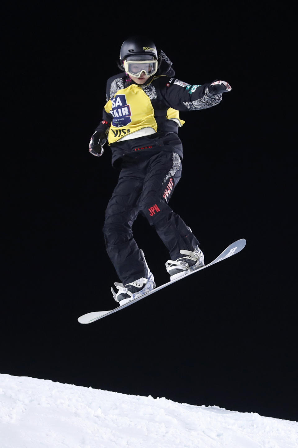 Reira Iwabuchi, of Japan, jumps during the finals of the Big Atlanta snowboard competition Friday, Dec. 20, 2019, in Atlanta. Iwabuchi won the event. (AP Photo/John Bazemore)