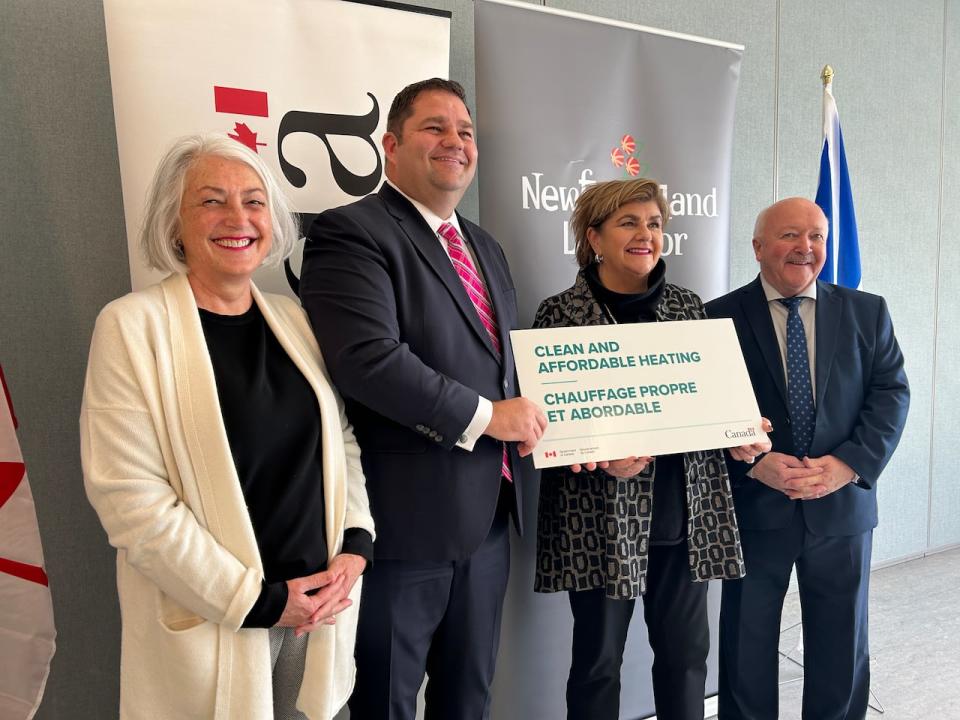 Liberal MP Joanne Thompson, provincial Environment Minister Bernard Davis, federal Rural Economic Development Minister Gudie Hutchings and federal MP Churence Rogers made the announcement in St. John's on Friday.  (Mike Moore/CBC - image credit)