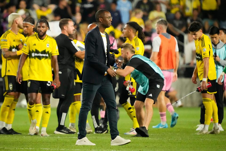 Aug 13, 2024; Columbus, Ohio, USA; Columbus Crew general manager Issa Tall walks across the field following the Leagues Cup round of 16 game against Inter Miami CF at Lower.com Field. The Crew won 3-2.