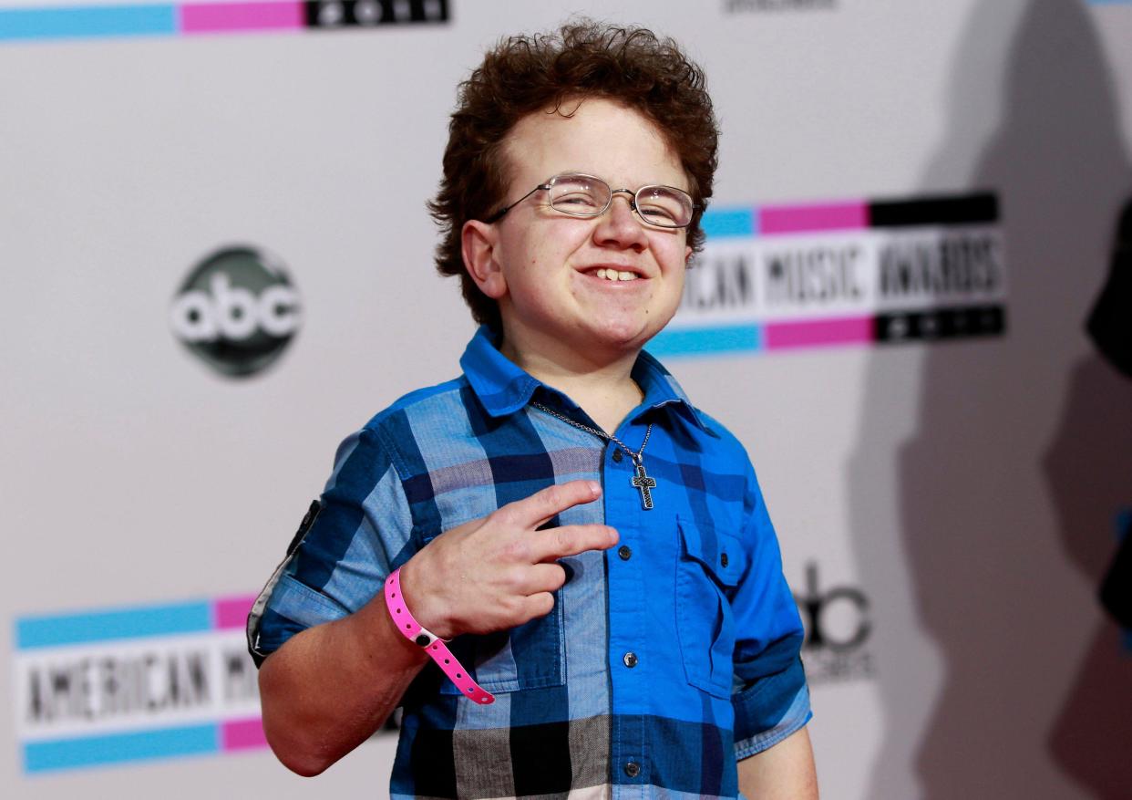 Keenan Cahill, internet star for lip-syncing songs, arrives at the 2011 American Music Awards in Los Angeles November 20, 2011. REUTERS/Danny Moloshok (UNITED STATES - Tags: ENTERTAINMENT) (AMA-ARRIVALS)