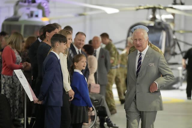 <p>AP Photo/Kin Cheung</p> King Charles arriving at the Army Aviation Centre in Hampshire on May 13