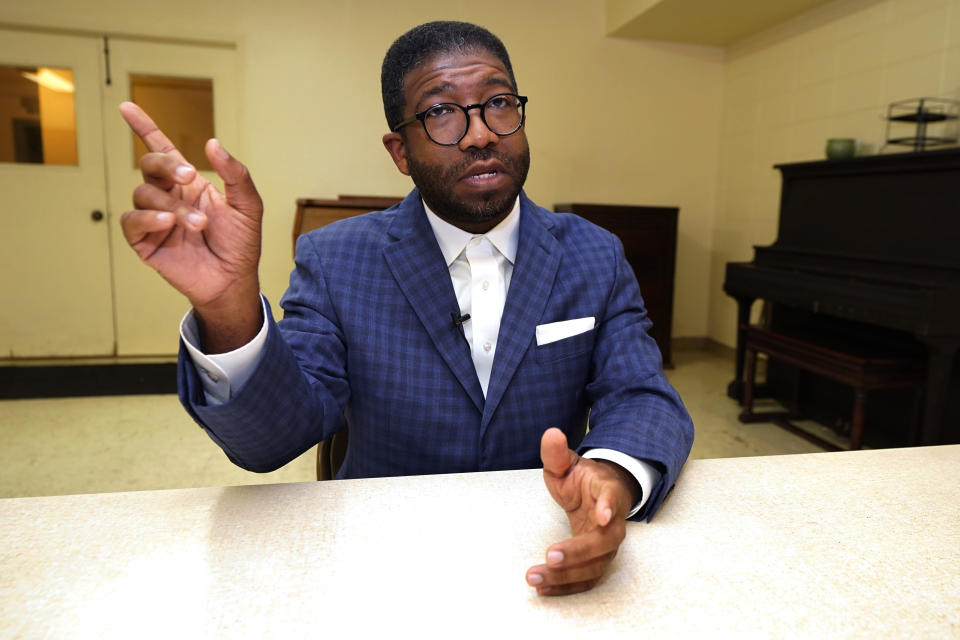 The Rev. CJ Rhodes of Mt. Helm Baptist Church in Jackson, Miss., says Feb. 14, 2023, that many people in the predominantly Black congregation strongly object to expanding territory of the state-run Capitol Police inside the city of Jackson and creating courts with appointed rather than elected judges. "They feel — viscerally feel — like this is taking us back to the 1950s and 1960s,” said Rhodes, who is the son of a civil rights attorney. (AP Photo/Rogelio V. Solis)