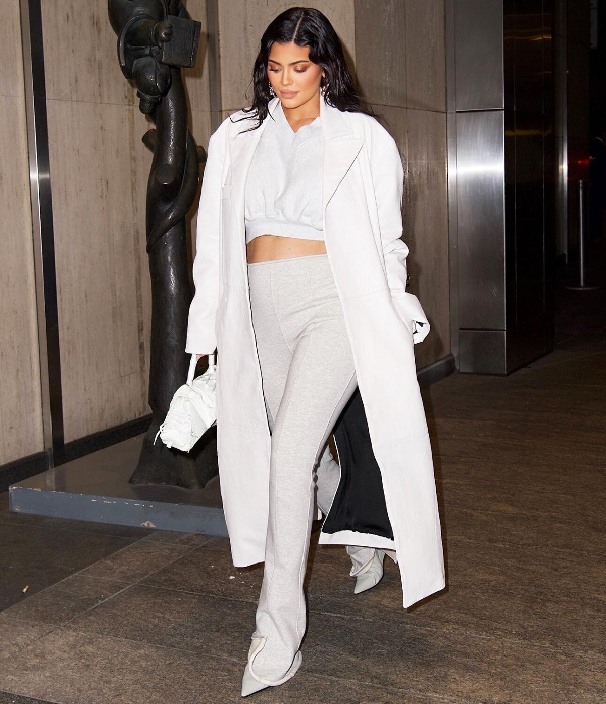 Kylie Jenner Shows Off Baby Bump During NYFW in White Leather Dress