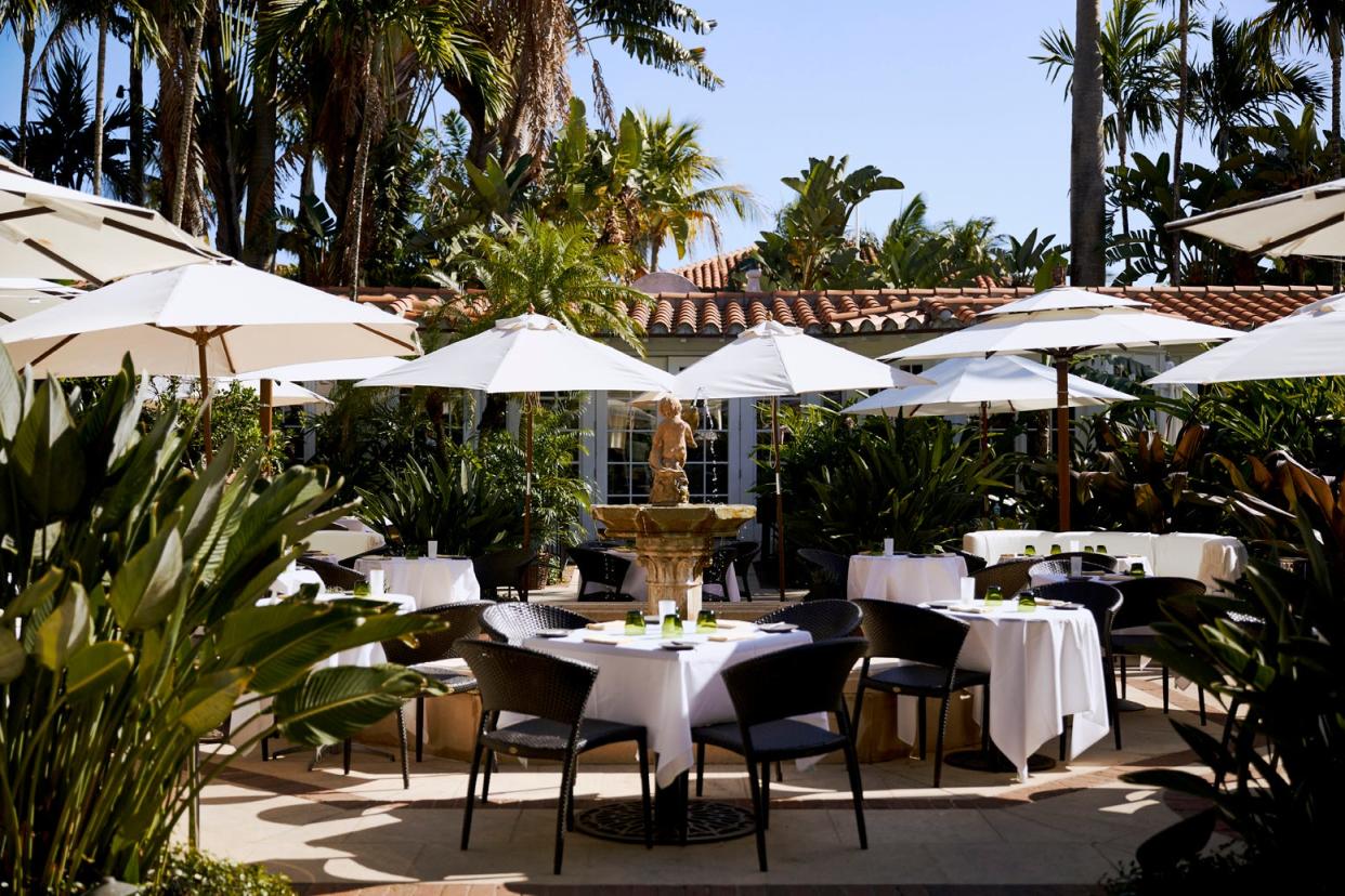 Outdoor courtyard dining at Cafe Boulud.