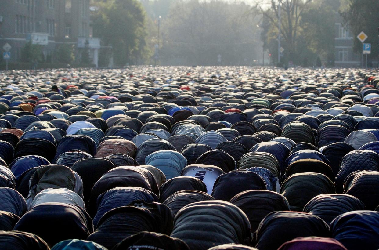 Muslims attend the morning prayers to celebrate Eid al-Fitr in Bishkek, Kyrgyzstan (REUTERS/Vladimir Pirogov)