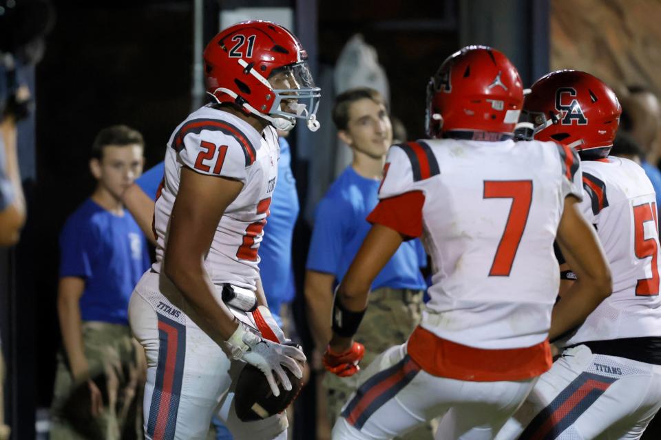 Carl Albert's Xavier Robinson celebrates after scoring a touchdown in the fourth quarter of a high school football game between Guthrie and Carl Albert in Guthrie, Okla., Thursday, Oct. 19, 2023. Carl Albert won 24-21.