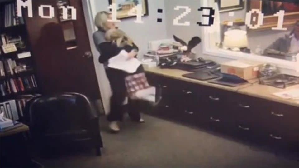 CCTV from the office showed Tannah launching into Ms Alexander's arms after learning she was finally being adopted. Source: Storyful