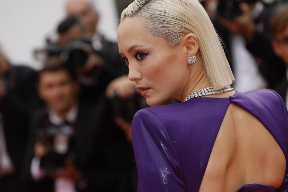 Pom Klementieff poses for photographers upon arrival at the opening ceremony and the premiere of the film 'Jeanne du Barry' at the 76th international film festival, Cannes, southern France, Tuesday, May 16, 2023. (Photo by Joel C Ryan/Invision/AP)