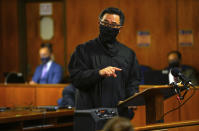 Judge Mark E. Windham gives last instructions to jurors seated in the courtroom for the trial of Robert Durst, a real estate scion charged with murder of longtime friend Susan Berman, in Los Angeles County Superior Court, Tuesday, May 18, 2021, in Inglewood, Calif. Durst's murder trial was delayed more than a year due to the Covid-19 pandemic. (Al Seib/Los Angeles Times via AP, Pool)