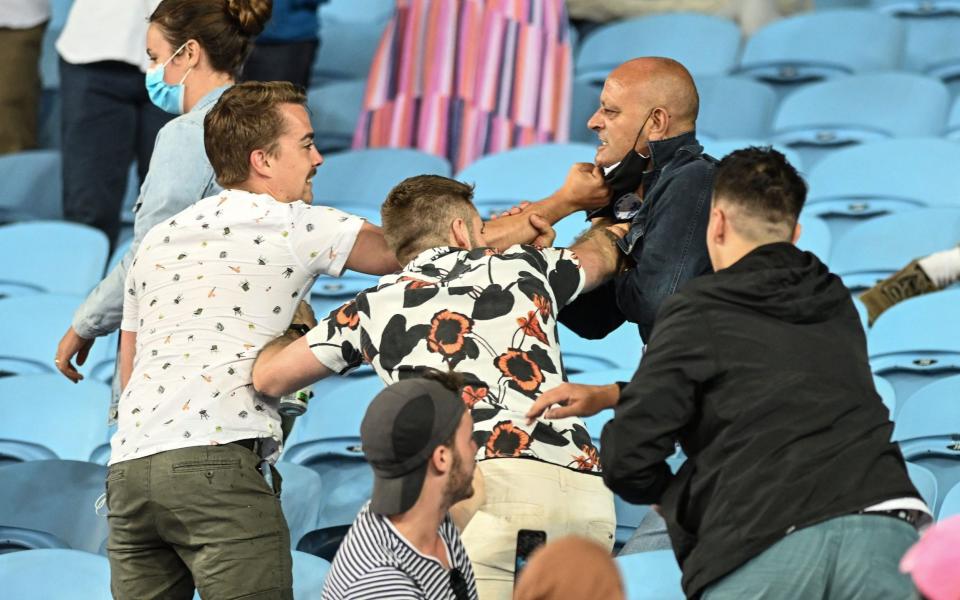 Fan ejected and fight breaks out in Melbourne as anti-mask furore overshadows day one at Australian Open - GETTY IMAGES