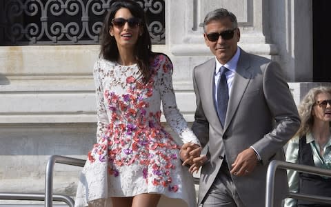 Italy is a popular location for celebrity weddings - George Clooney and British lawyer Amal Alamuddin were married in Venice in 2014 - Credit: AFP/Getty