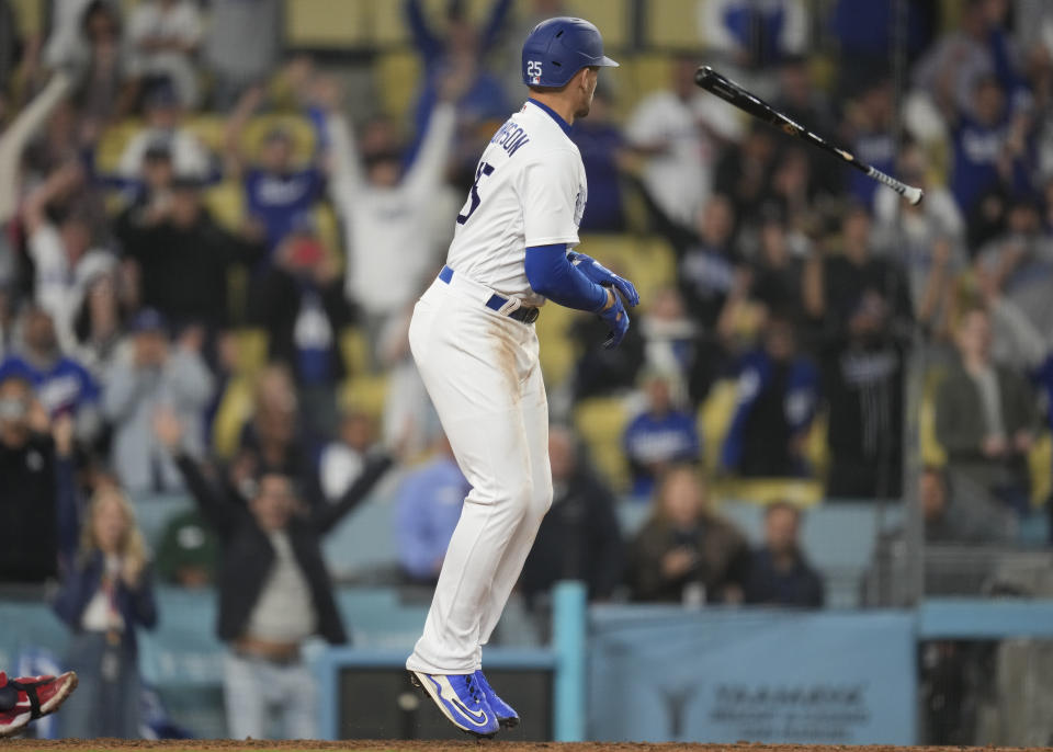 Los Angeles Dodgers' Trayce Thompson (25) tosses his bat as he walks during the twelfth inning of a baseball game against the Minnesota Twins in Los Angeles, Monday, May 15, 2023. Chris Taylor scored to win the game 9-8. (AP Photo/Ashley Landis)