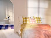 <p>India was inspired by the blinding colours you see when you close your eyes in front of the sun, and these peachy, yellow and pink tones instantly warm up a bedroom or living space.</p><p>We love how they go together to create the look of a sunrise indoors.</p>