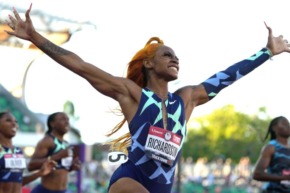 Richardson celebrates after winning the women's 100m at Olympic trials.