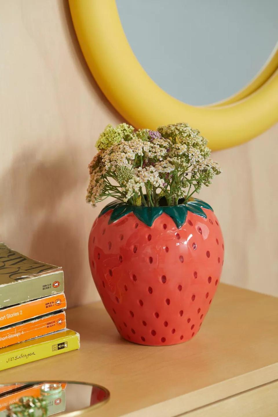 <p><a href="https://go.redirectingat.com?id=74968X1596630&url=https%3A%2F%2Fwww.urbanoutfitters.com%2Fshop%2Fbando-strawberry-field-vase&sref=https%3A%2F%2Fwww.thepioneerwoman.com%2Fholidays-celebrations%2Fgifts%2Fg44819088%2Fgifts-for-teen-girls%2F" rel="nofollow noopener" target="_blank" data-ylk="slk:Shop Now;elm:context_link;itc:0;sec:content-canvas" class="link ">Shop Now</a></p><p>Strawberry Field Vase</p><p>urbanoutfitters.com</p><p>$28.00</p><span class="copyright">Urban Outfitters</span>