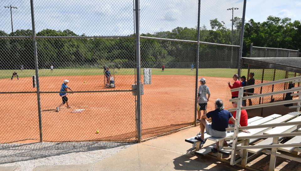 Adult softball fields at 17th St. Park. Sarasota County is interested in banning cigarette smoking at public parks like this one.