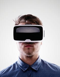 <span class="caption">Live-action VR is helpful as a therapeutic tool for victims and perpetrators.</span> <span class="attribution"><a class="link " href="https://www.shutterstock.com/image-photo/man-wearing-virtual-reality-goggles-studio-394698058" rel="nofollow noopener" target="_blank" data-ylk="slk:Shutterstock;elm:context_link;itc:0;sec:content-canvas">Shutterstock</a></span>