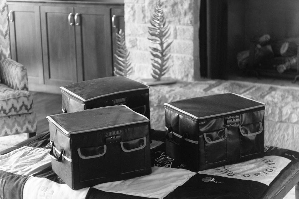 Three fireproof boxes with Mason's most important personal possessions. (Micah McCoy for NBC News)