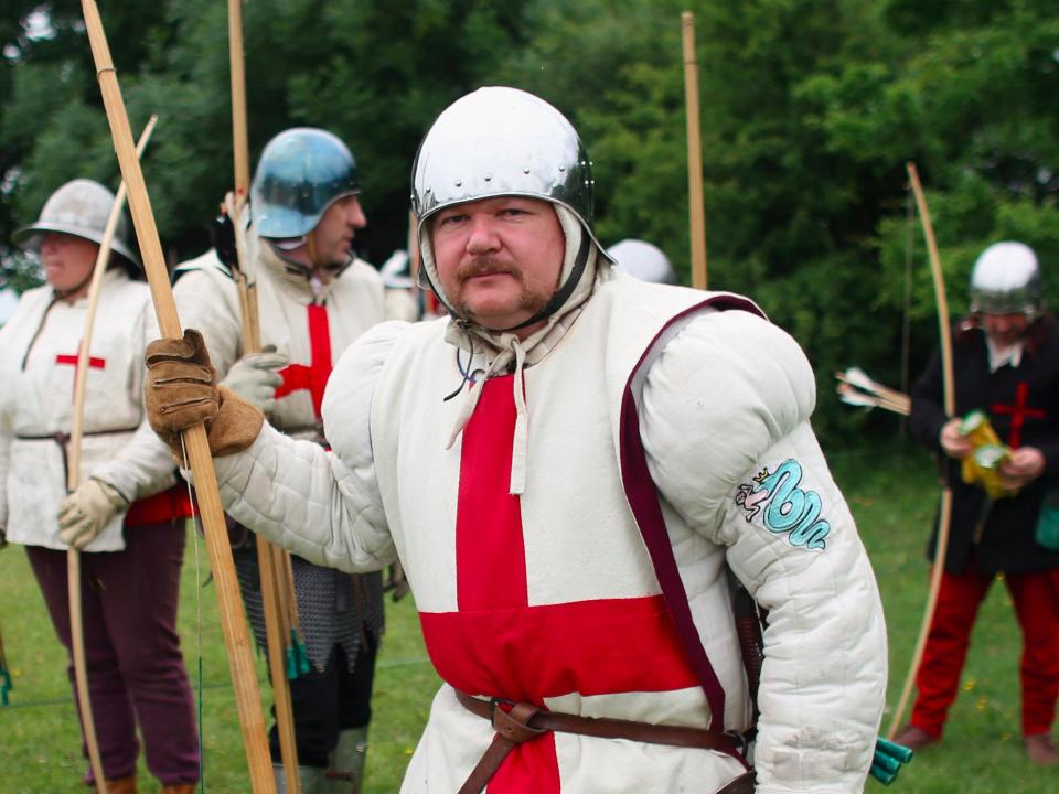 Re-enactors in period costume prepare to stage a medieval battle at Eltham Palace on June 16, 2013 in Eltham, England. The 'Grand Medieval Joust' event at Eltham Palace, an English Heritage property which was the childhood home of King Henry VIII, aims to give a great insight into life at the palace during the medieval period. (Photo by Oli Scarff/Getty Images)