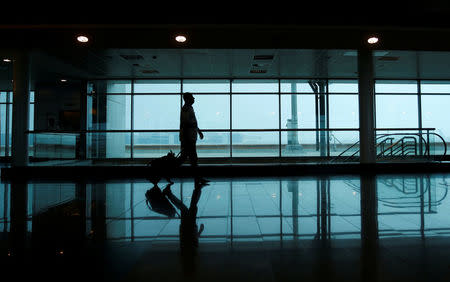 A passenger walks to his gate at Cairo International Airport, Egypt October 30, 2016. Picture taken October 30, 2016. REUTERS/Amr Abdallah Dalsh