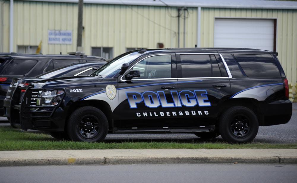 Law enforcement vehicles are shown outside the police station in Childersburg, Ala., on Monday, Aug. 29, 2022. (AP Photo/Jay Reeves)