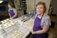 Julie Muller, who sells cookie decorating kits on Etsy, poses in her kitchen Tuesday, Sept. 22, 2020, in Houston. One of the cookie-decorating kits she offers has a Black Lives Matter theme. Amid all the Black Lives Matter themed T-shirts, face masks and signs appearing in recent months, some unconventional merchandise has been popping up on online crafts marketplace Etsy. (AP Photo/David J. Phillip)