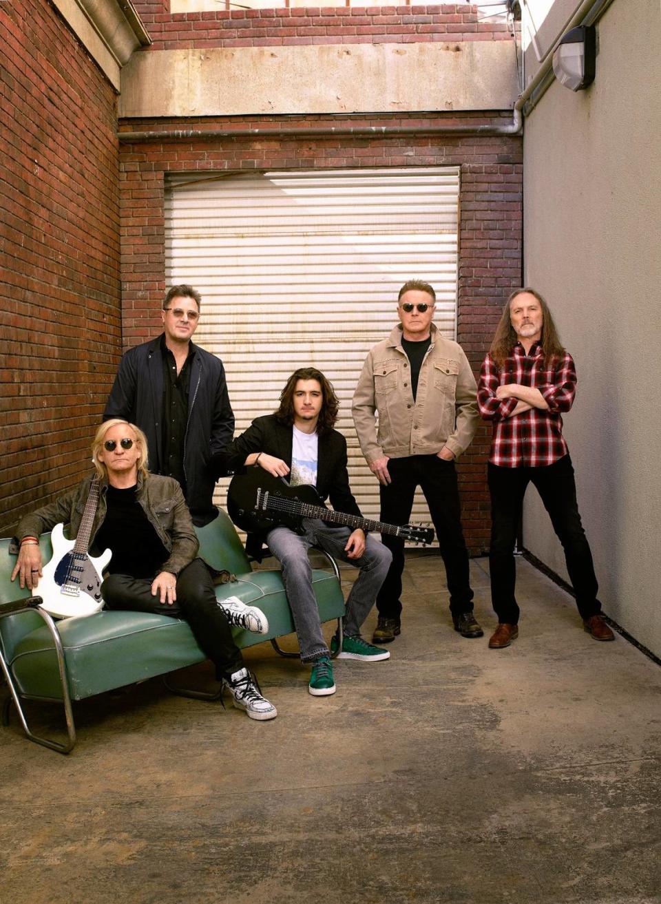 Eagles’ current lineup includes Joe Walsh and Deacon Frey (seated), Vince Gill, Don Henley and Timothy B. Schmit.