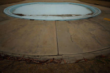 The children's section of Trafalgar swimming pool lies empty in Cape Town, South Africa, February 9, 2018. The city has closed many of its public swimming pools and has imposed severe water restrictions in an attempt to avert a major water crisis. REUTERS/Mike Hutchings