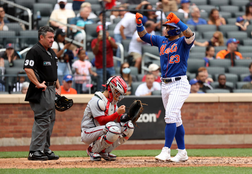 NEW YORK, NEW YORK - AUGUST 29: Javier Baez #23 of the New York Mets reacts after hitting a two run home run during the bottom of the fourth inning of a game against the Washington Nationals at Citi Field on August 29, 2021 in New York City. (Photo by Dustin Satloff/Getty Images)