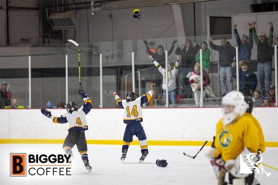 The Gaylord Jr. Blue Devils 8U hockey team celebrates after winning the MAHA State Championship on Sunday, March 5.