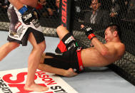 SAITAMA, JAPAN - FEBRUARY 26: Yushin Okami lies on the canvas after being knocked down by a punch from Tim Boetsch during the UFC 144 event at Saitama Super Arena on February 26, 2012 in Saitama, Japan.