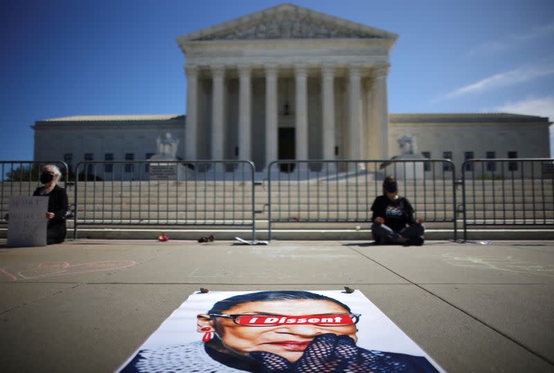 People gather in front of the U.S. Supreme Court following the death of U.S. Supreme Court Justice Ruth Bader Ginsburg, in Washington