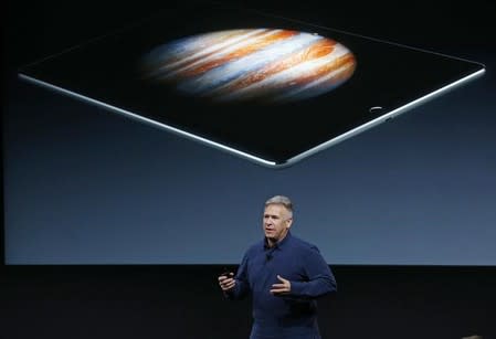 Phil Schiller, senior VP of worldwide marketing for Apple, introduces the iPad Pro with 9.7-inch display during an event at the Apple headquarters in Cupertino, California March 21, 2016. REUTERS/Stephen Lam