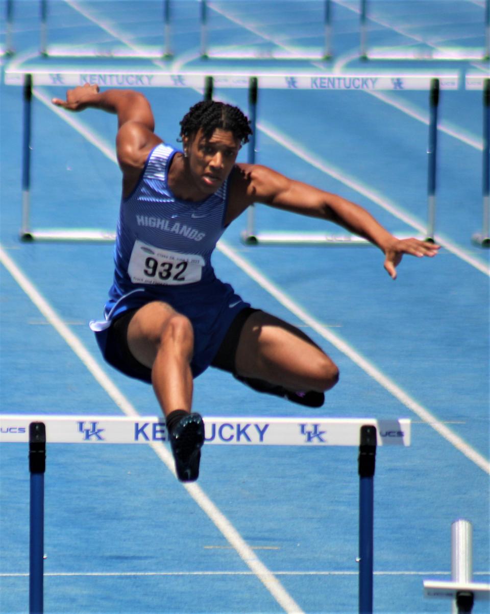 Highlands junior Aiden Nevels finishes his third-place run in the 300 hurdles during the Kentucky High School Athletic Association Class 2A state track and field championships June 3, 2022, at the University of Kentucky track and field complex, Lexington, Ky.